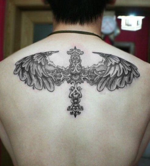 点击大图看下一张：十字架翅膀个性纹身
