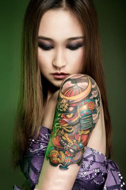 点击大图看下一张：个性女生霸气的日本武士手臂纹身