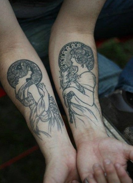 点击大图看下一张：情侣宗教头像手臂纹身