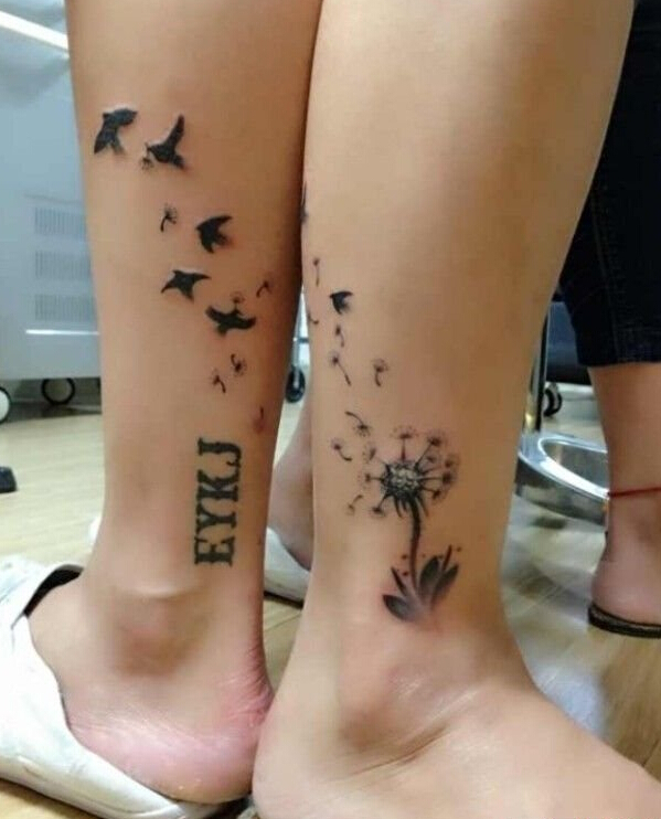 点击大图看下一张：蒲公英与鸟儿情侣纹身