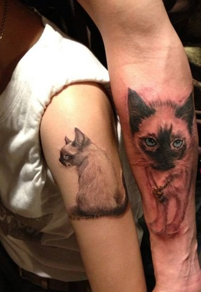 点击大图看下一张：个性情侣手臂可爱猫咪纹身