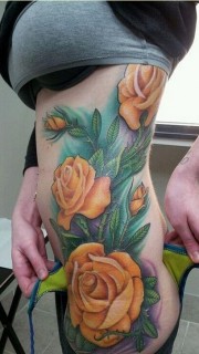 性感女性腰腹漂亮好看的玫瑰花纹身