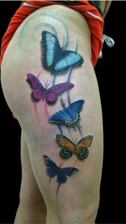 大腿时尚漂亮的彩色蝴蝶纹身