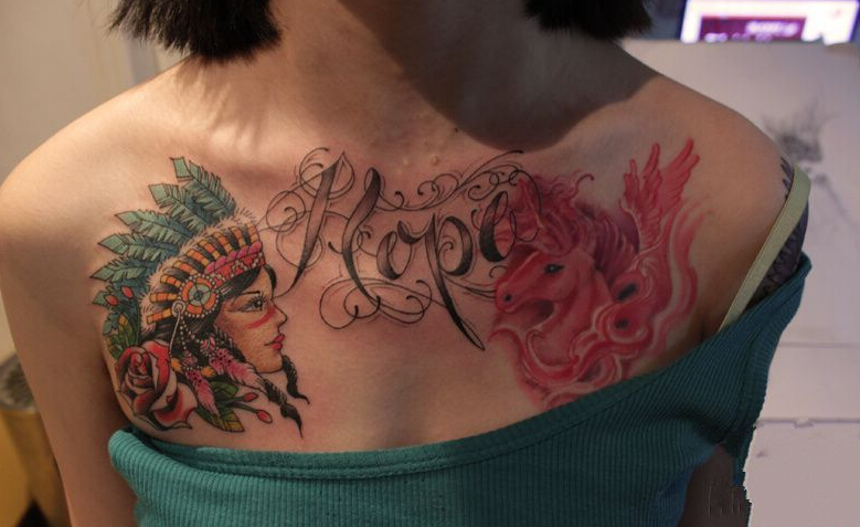 点击大图看下一张：女生胸前个性创意图腾纹身