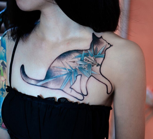 点击大图看下一张：美女胸部创意竹子猫咪纹身
