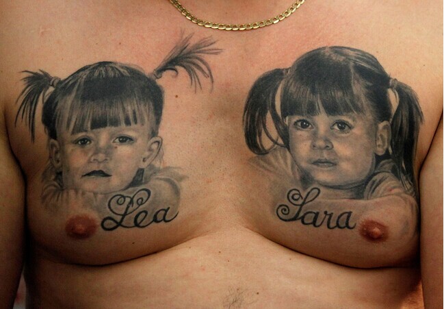 点击大图看下一张：男生胸部好看的女孩肖像纹身