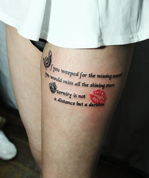 点击大图看下一张：美女大腿红唇英文个性纹身