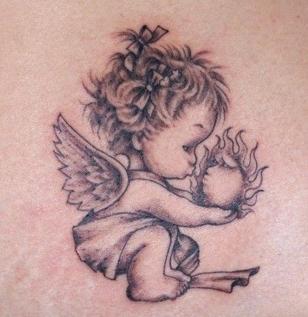 点击大图看下一张：超萌的小天使丘比特纹身
