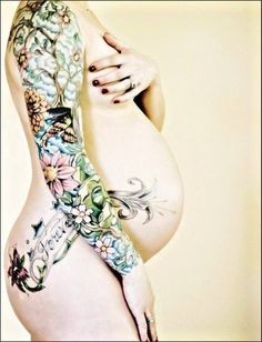 点击大图看下一张：孕妇的性感纹身