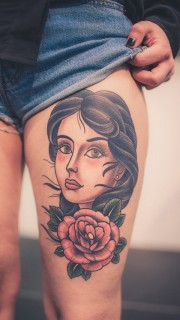 女性大腿上个性女人头像纹身
