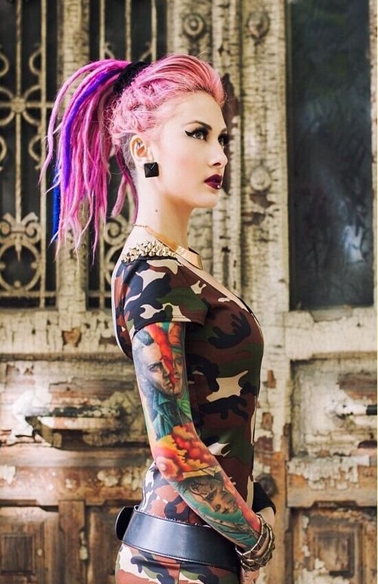 点击大图看下一张：个性女人时尚花臂纹身图案