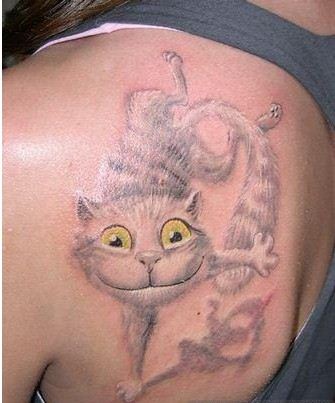 点击大图看下一张：美女背部可爱的卡通3d猫纹身