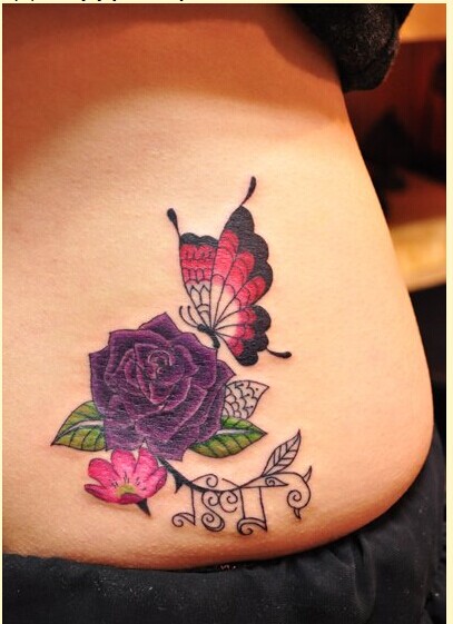 点击大图看下一张：美女腰部好看蝴蝶玫瑰纹身图案