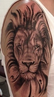 个性手臂霸气狮子纹身图片