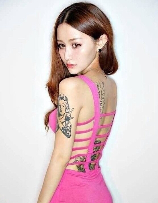 点击大图看下一张：个性美女梦露手臂纹身图案