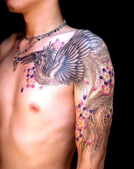 点击大图看下一张：男性手臂凤凰樱花纹身图案