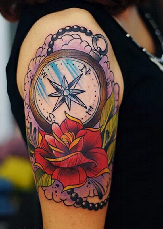 点击大图看下一张：手臂彩色玫瑰指南针纹身图案