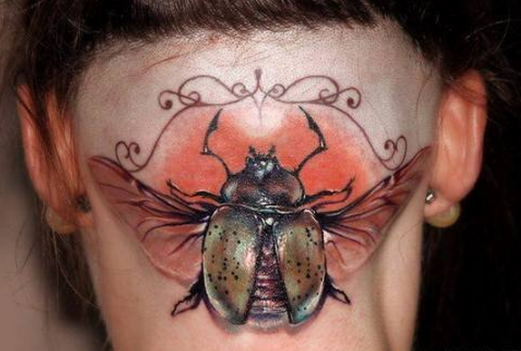点击大图看下一张：头部昆虫纹身图案