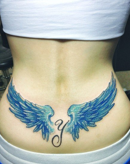 点击大图看下一张：美女腰部漂亮精美的彩色翅膀纹身图案