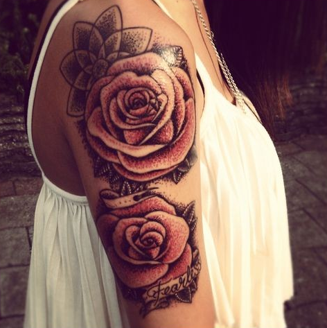点击大图看下一张：能手臂漂亮的玫瑰纹身