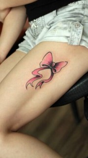 女性腿部彩色小清新蝴蝶结纹身图案