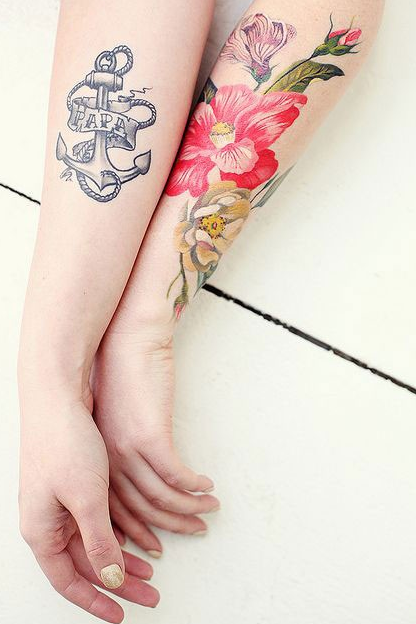 点击大图看下一张：情侣手臂漂亮的纹身