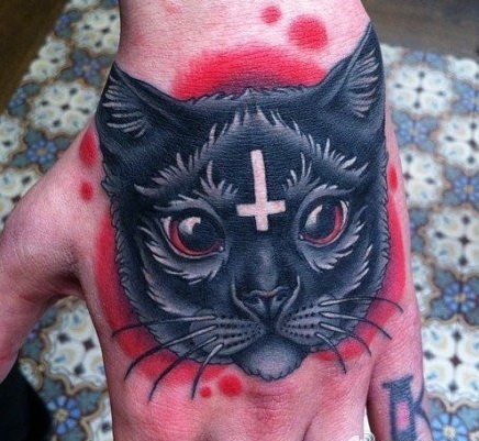 点击大图看下一张：手臂潮流时尚的猫咪纹身