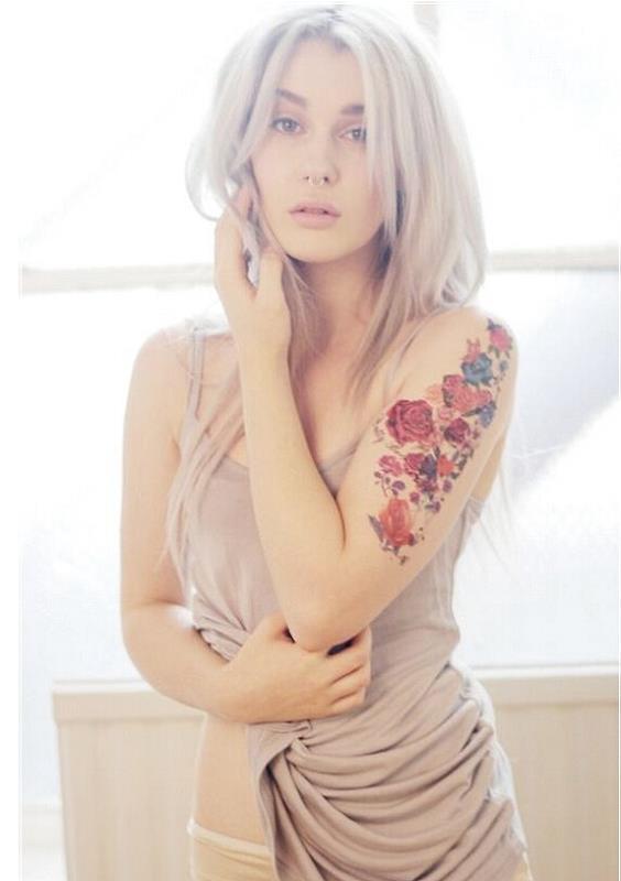 点击大图看下一张：时尚欧美女手臂好看的玫瑰蝴蝶纹身