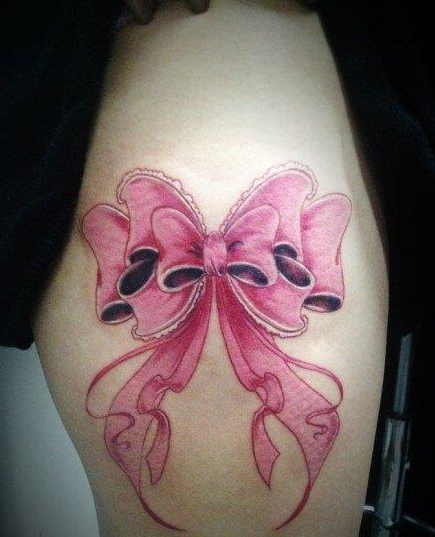 点击大图看下一张：女生腿部精致好看的蝴蝶结纹身图案