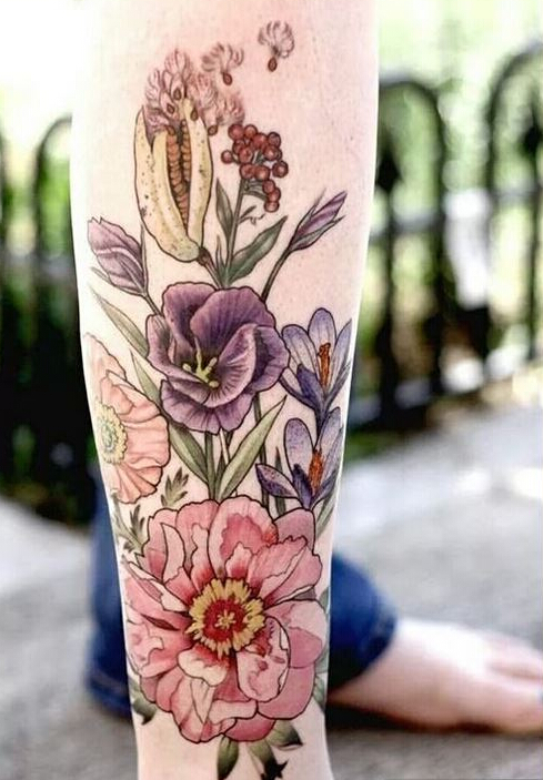 点击大图看下一张：个性腿部时尚好看的彩色花卉纹身图案