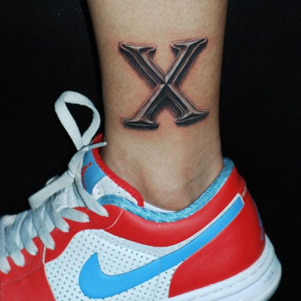 点击大图看下一张：酷帅霸气X纹身图案