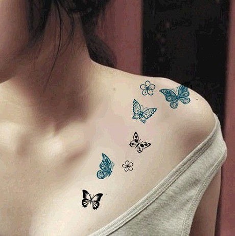 点击大图看下一张：女生颈部彩色蝴蝶性感纹身