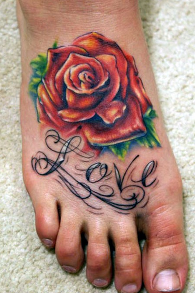 点击大图看下一张：脚背优雅的玫瑰纹身