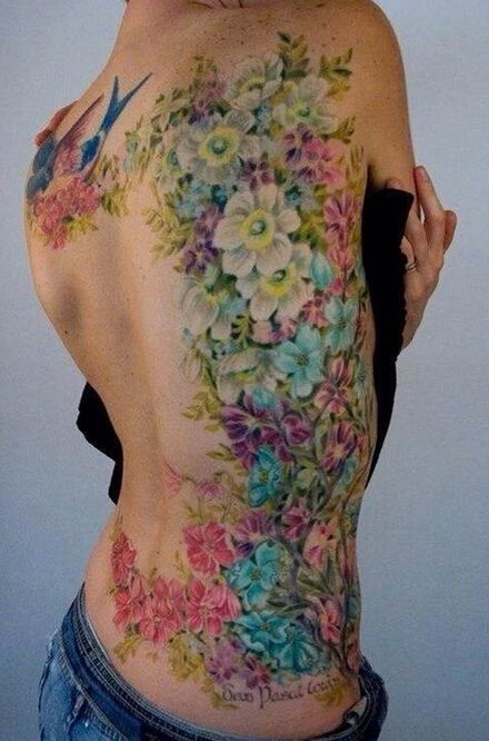 点击大图看下一张：半身腰部植物图案纹身