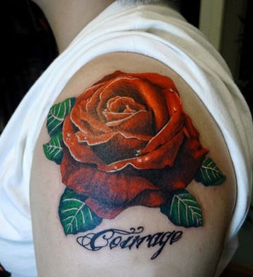 点击大图看下一张：手臂好看的彩色玫瑰花纹身图案