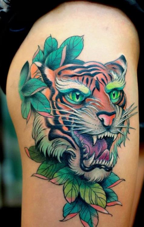 点击大图看下一张：腿部彩色凶猛的老虎纹身