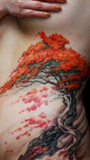 女性腰腹上好看的树纹身图案