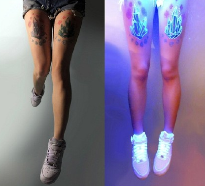 点击大图看下一张：美女漂亮的大腿荧光纹身