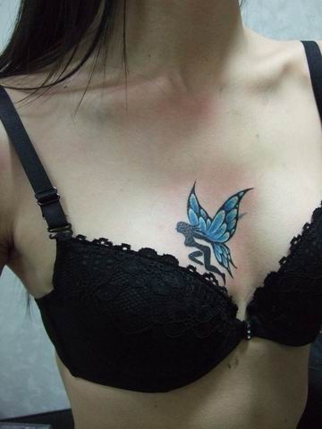 点击大图看下一张：女生胸部性感的蝴蝶精灵纹身