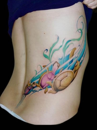 点击大图看下一张：女生腰部可爱的小海龟纹身图案