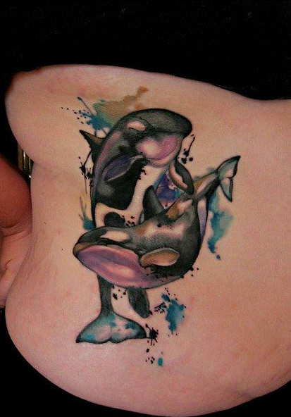 点击大图看下一张：水墨风海豚纹身图案