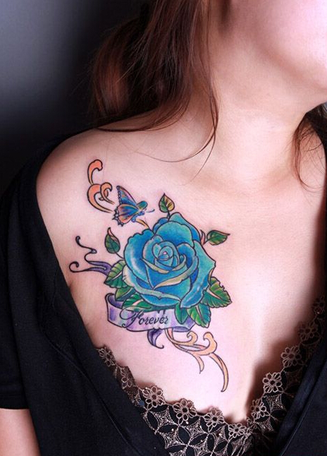 点击大图看下一张：性感胸蓝色玫瑰花纹身