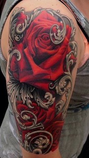 霸气十足的大臂玫瑰花纹身图案