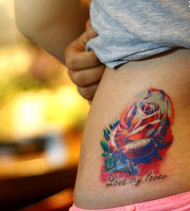 点击大图看下一张：色彩渲染玫瑰花纹身