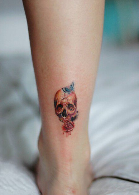 点击大图看下一张：创意小骷髅脚踝纹身图案