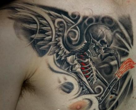 点击大图看下一张：男士胸前个性另类的骷髅纹身