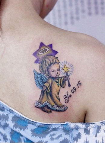 点击大图看下一张：女孩子肩背可爱流行的小天使刺青