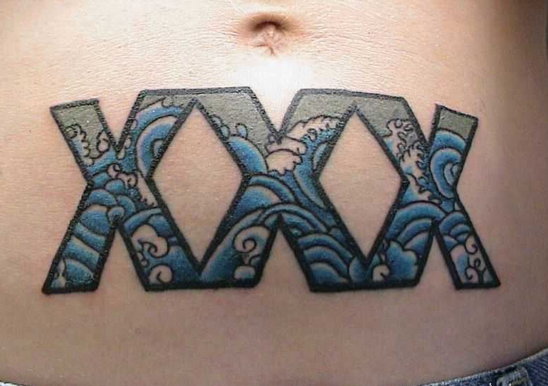 点击大图看下一张：嵌有波浪的XXX刺青