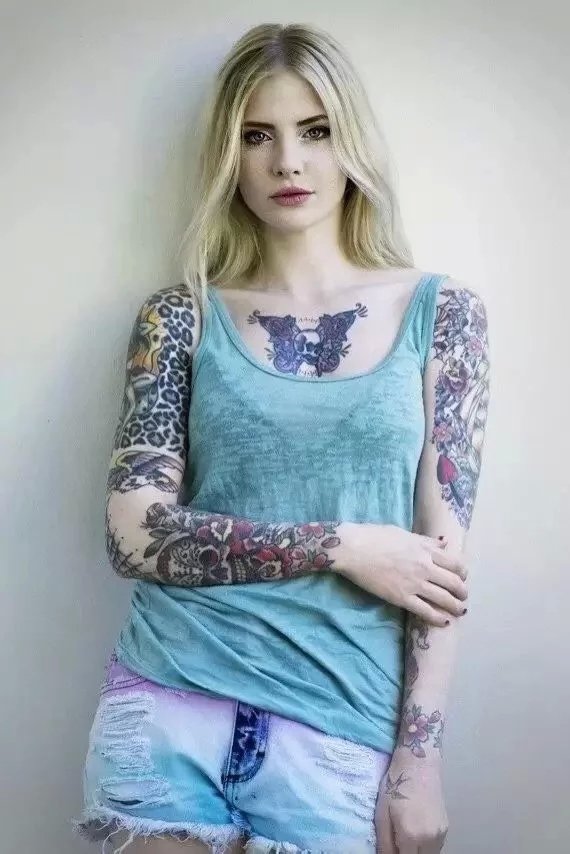 点击大图看下一张：美女双花臂纹身图案大全