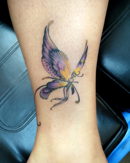 点击大图看下一张：腿部蝴蝶精灵纹身